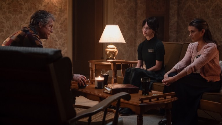 Hugh Grant Chloe East and Sophie Thatcher in Heretic